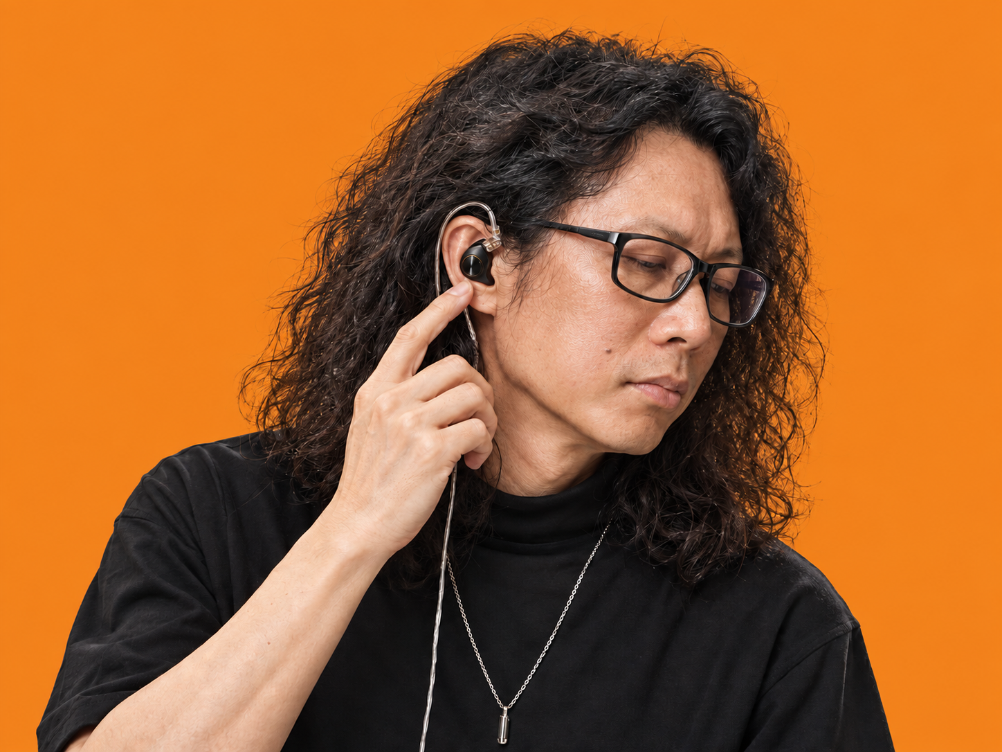 A Hong Kong musician wearing AUVI in-ear monitors.